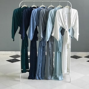 Soft Bridesmaid robes in long lengths for Bridal party, Mother of the Bride in elegant hues of pastel blues. Personalized satin kimono robes