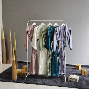 Bridesmaid robes long ankle length in hues of blues, sage and emerald. Calf length silk personalized robes in plus size for bridal party.