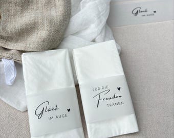 Transparent banderoles for handkerchiefs with the sayings Glück im Auge & Für die Freudenreißeren