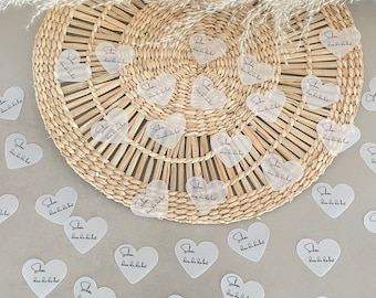 Wedding decoration: Transparent scatter decoration in the shape of a heart - So glad you're here!