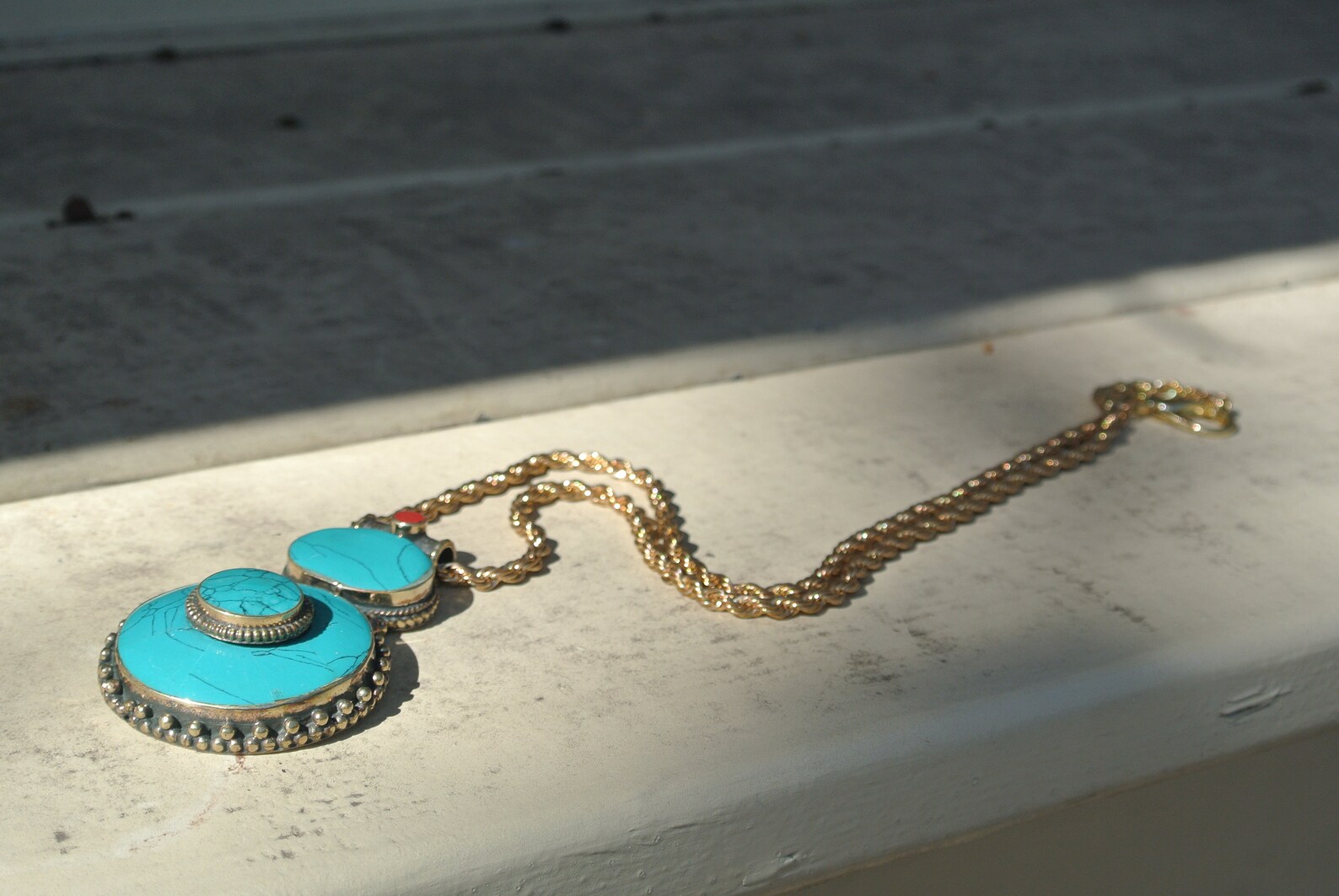 Turquoise pendant on golden chain Etsy