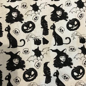 May include: Black and white fabric with a repeating pattern of witches, cats, bats, pumpkins, ravens, and skulls. The fabric has a vintage aesthetic.