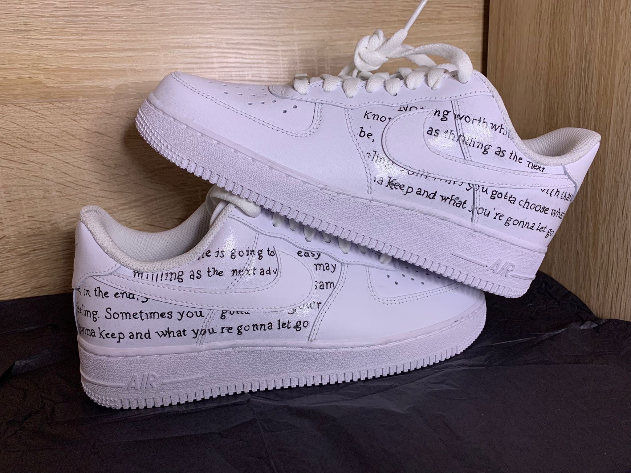 air force ones with words on them