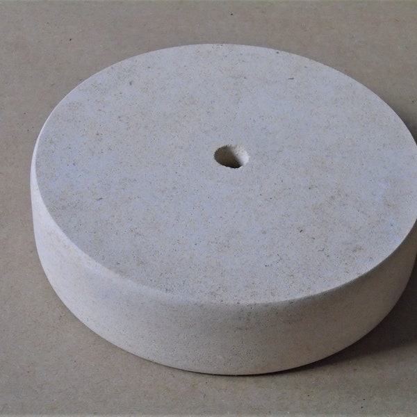 An Ancaster Hardwhite Limestone Base