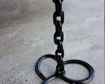 Paper Towel holder of welded horseshoes and chain