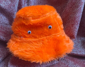 orange bucket hat googly eyes