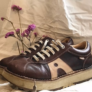 Art shoe company top