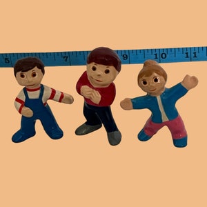 Puppet figurines from the children's television program Passe-Partout, featuring Cannelle and Pruneau, their cousin Rigodon, set of 3