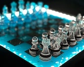 → Переглянути на Etsy: Handmade LED Epoxy Resin Chess Set: Aqua Glow LED Backlight Handmade LED Epoxy Resin Chess Set: Aqua Glow LED Backlight