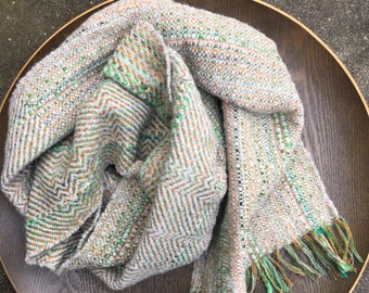 Handwoven luxury lambswool blanket scarf | ecru, greens, blues and burnt orange