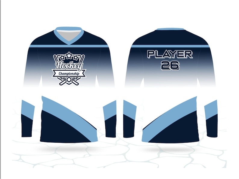 May include: A long-sleeved hockey jersey in white, navy blue, and light blue. The front has "Hockey Championship" and crossed hockey sticks. The back shows "PLAYER 26". A sports-themed garment.