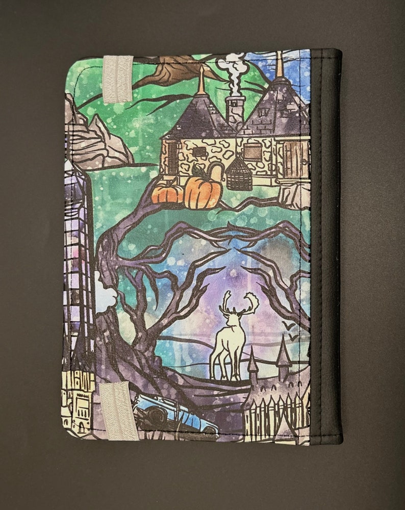 May include: A colourful illustrated fabric featuring a scene from the Harry Potter universe. The fabric depicts a cottage with a chimney, a stag, a car, and a castle. The fabric is perfect for crafting projects like tote bags, cushions, and more.
