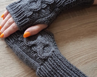 Ladies soft and cosy dark grey hand knitted cable pattern wrist warmers with thumb hole, NEW