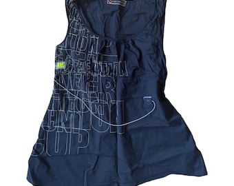 May include: Black sleeveless tank top with a white graphic print of the word "Champion" repeated in different sizes and orientations.