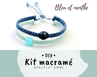 May include: DIY macrame bracelet kit with blue and mint colored cords. The kit includes a blue and mint macrame bracelet with a turquoise bead. The text on the image reads "Bleu et menthe" and "Kit macramé bracelet AMMI".
