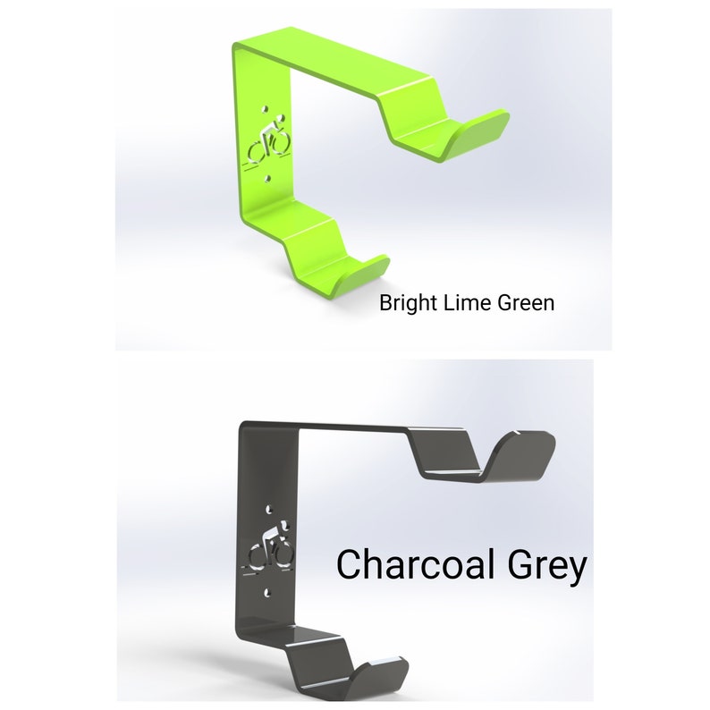May include: Two bike hooks, one in bright lime green and one in charcoal grey. Both hooks have a bicycle silhouette cutout and a double hook design.