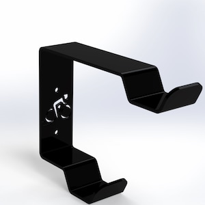 May include: Black metal bike hook with a bicycle silhouette cutout. The hook has two arms for hanging bikes.