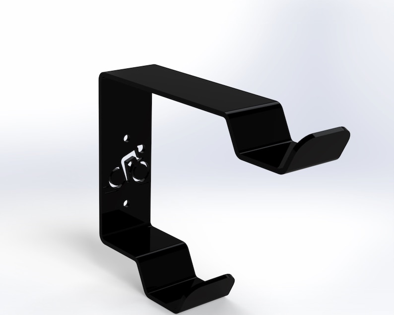 May include: Black metal bike hook with a bicycle silhouette cutout. The hook has two arms for hanging bikes.