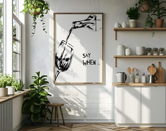 May include: A black and white illustration of a wine bottle pouring into a glass with the text "Say When..." on a white background. The illustration is framed and hanging on a white brick wall.