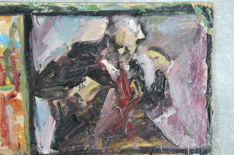 May include: Abstract painting with a dark background and vibrant strokes of red, yellow, and purple paint. The painting is framed in a black frame.