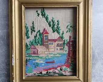 Vintage picture, embroidered with a cross on a canvas in a wooden frame, handmade wall decor.