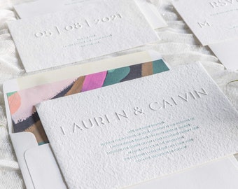 oblation all-cut white handmade paper blind embossed letterpress wedding invitation | lauren suite sample