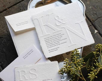 oblation deckled edge white handmade paper blind embossed letterpress wedding invitation | roma suite sample