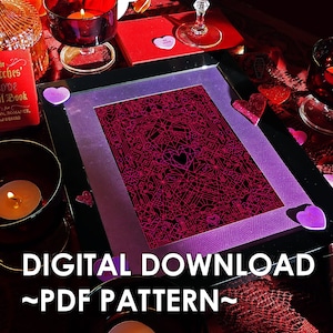 May include: A digital download of a pink and black geometric pattern with hearts. The pattern is in a purple frame and is on a red background with candles and hearts.