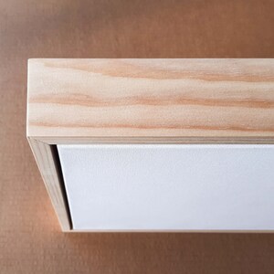 A pine floating frame.
