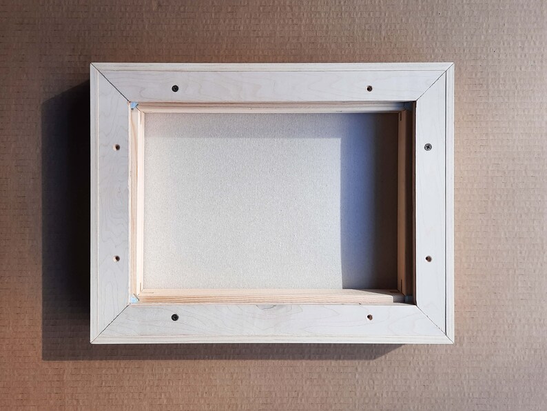 A backside view of a floating frame.