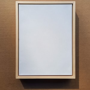 Framed 1.5" thick canvas in a pine canvas floating frame.