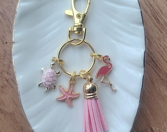 Portachiavi con ciondolo a forma di fenicottero: nappa rosa, stella marina, tartaruga