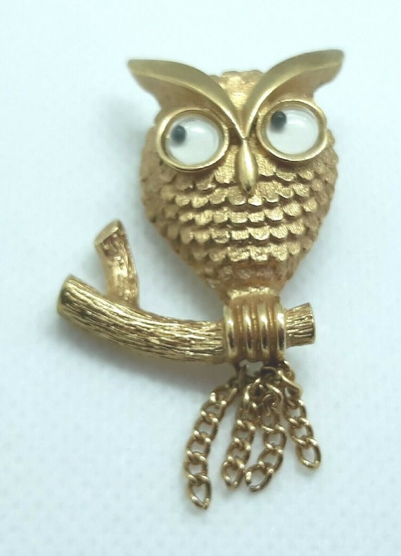 Vintage Avon gold tone fabulous brooch pin googly 