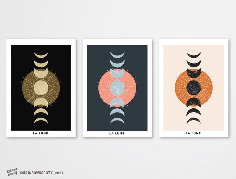 May include: Three minimalist art prints with a moon phase design. Each print features a different color background: black, blue, and beige. The moon phases are depicted in black and white, with a large circle in the center of each print.