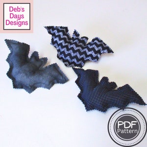 May include: Three fabric bat shapes, one with a chevron pattern, one with a polka dot pattern, and one solid black. The bats are all sewn and ready to be stuffed. The image also includes the text "PDF Pattern".