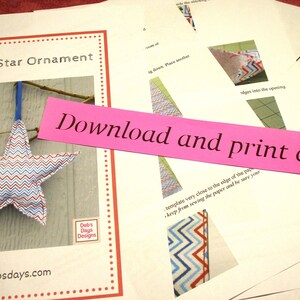 May include: A printable pattern for a stuffed star ornament. The pattern includes instructions for sewing the star and a template for cutting out the fabric. The finished ornament is red, white, and blue with a chevron pattern.