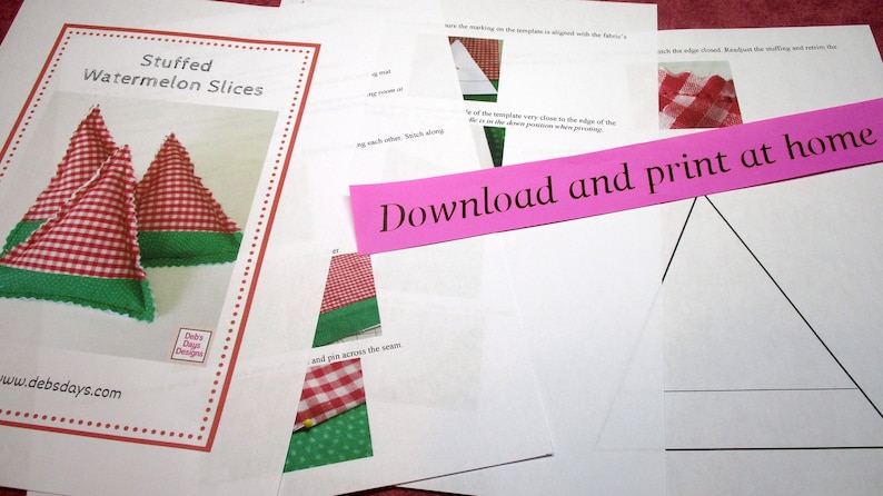 May include: A printable pattern for making stuffed watermelon slices. The pattern includes instructions and a template for cutting out the fabric. The text on the pattern says "Download and print at home".