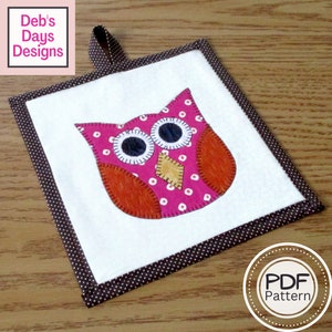 May include: A pink and orange owl pot holder with white polka dots and a brown border. The pot holder has a loop for hanging.  PDF Pattern.