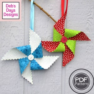 pinwheel ornament with hanging ribbon with button in center
