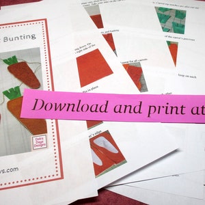May include: A printable pattern for a fabric carrot bunting. The pattern includes instructions and templates for creating a string of carrots with green tops. The text on the pattern reads "Fabric Carrot Bunting" and "Download and print at home".