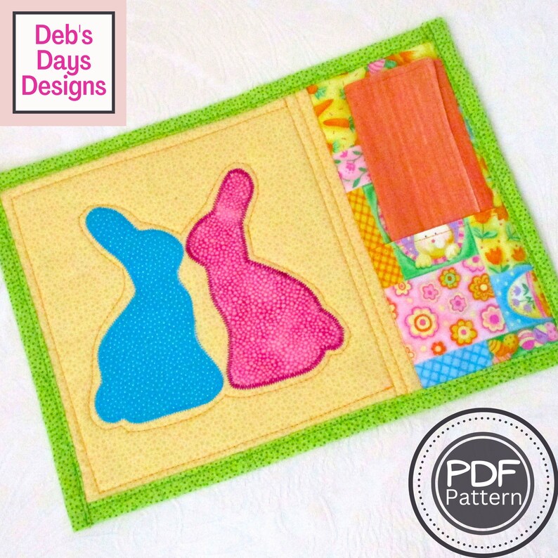 May include: A PDF pattern for a quilted Easter bunny coaster with a pocket. The coaster is yellow with green trim and features two bunnies, one blue and one pink. The pocket is made of colorful patchwork fabric.