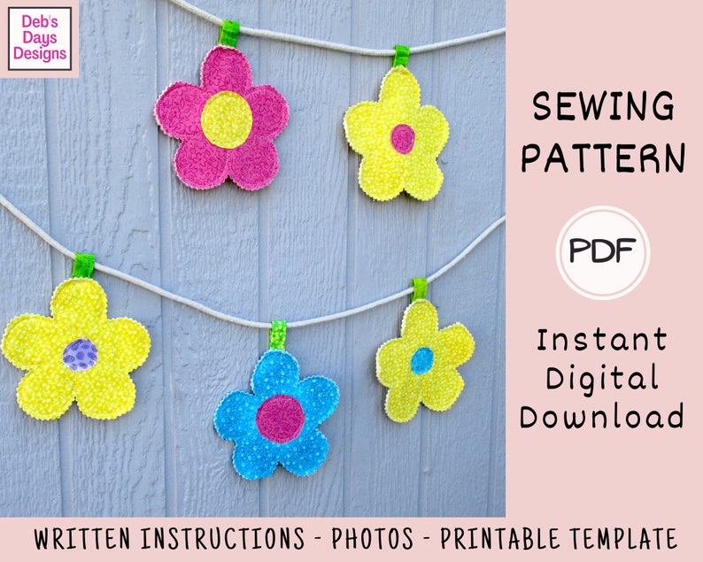 May include: A sewing pattern for a flower garland. The pattern includes written instructions, photos, and a printable template. The garland is made of five flowers in pink, yellow, and blue.