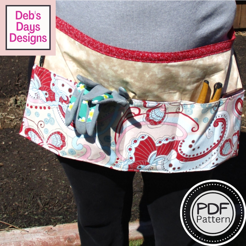 gardening apron with tools inside and is tied around the back