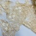 Royalty Fabrics Multi color Sun flower 3d design embroider in a champagne mesh lace-sold by the yard.