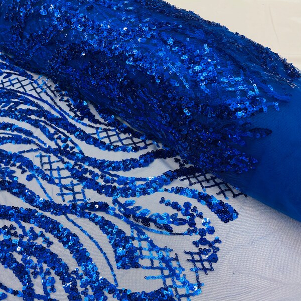 ROYAL BLUE DIVA DESIGN EMBROIDERY WITH HEAVY BEADED ON A MESH-SOLD BY YARD. main image 0