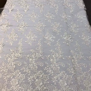 Ivory Flower Lace Fabric - Floral Clusters Embroidered With sequins on a Mesh Lace Fabric Sold By The Yard