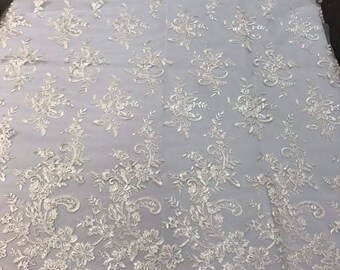 Ivory Flower Lace Fabric - Floral Clusters Embroidered With sequins on a Mesh Lace Fabric Sold By The Yard