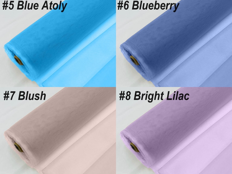 May include: Four rolls of tulle fabric in different colours: blue, light blue, blush pink, and lilac. The fabric is rolled up and the ends are visible. The numbers #5, #6, #7, and #8 are visible in the top corners of each roll, along with the colour names: Blue Atoly, Blueberry, Blush, and Bright Lilac.