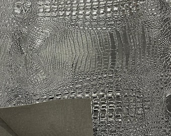 Tissu vinyle crocodile noir : revêtement imitation cuir 3D - 54" de large