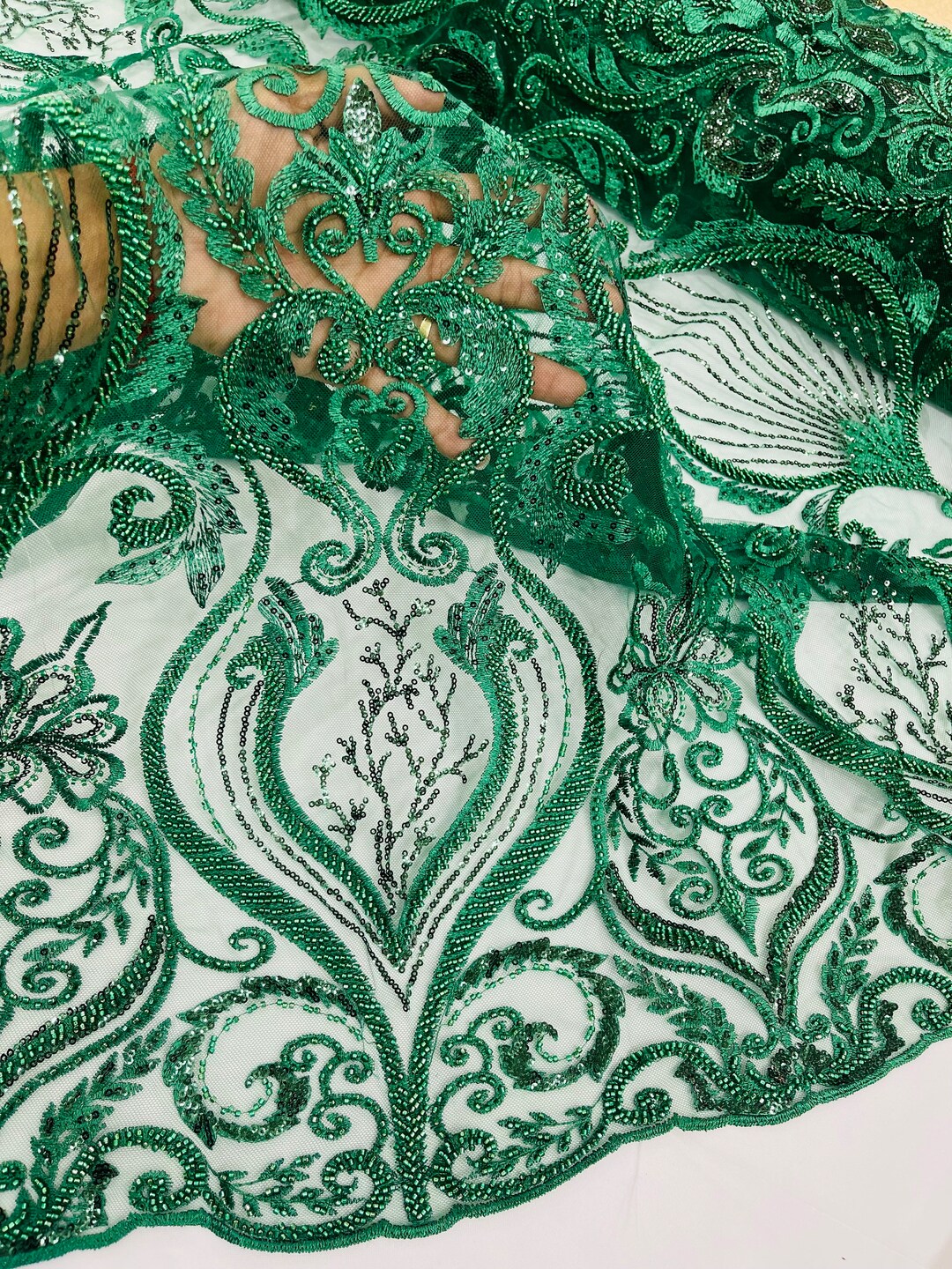 Hunter Green diva design embroidery with heavy beaded on a mesh lace-sold by the yard. main image 1